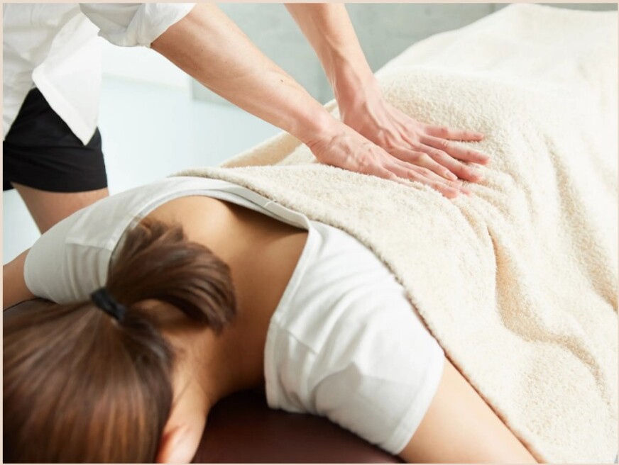 Chiropractor adjusting a patient's leg at The Chiropractic Studio in Lichfield
